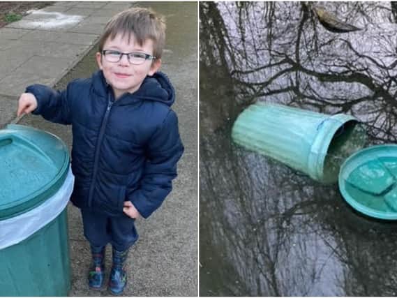 The five-year-old was in Thornes Park to feed the duck with dad, John, when they saw three teenagers pick the bin up and throw it into the duck pond.