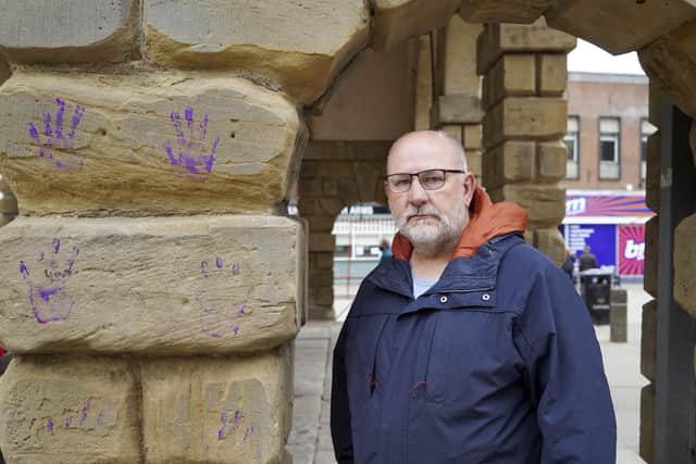 Phil Cook, Pontefract Civic Society vice chair pictured with the damages to the Buttercross
