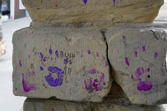 The yobs threw purple, green and pink paint across benches and left hand prints on the walls