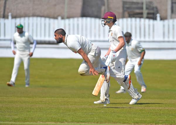 Al-Mustafa Rafique bowling for Wrenthorpe against Methley. Picture: Steve Riding