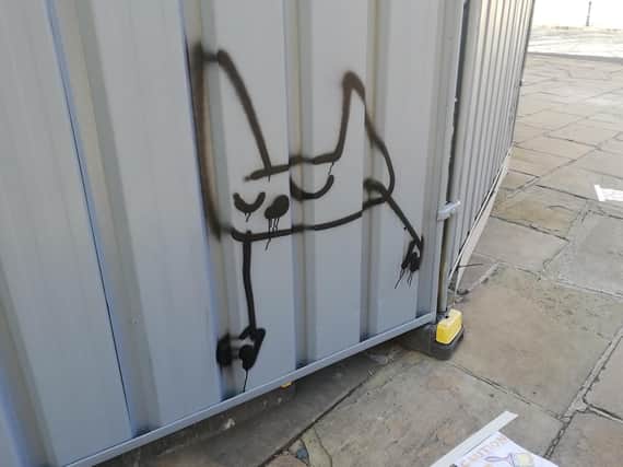 The graffiti has appeared in several places in the city.