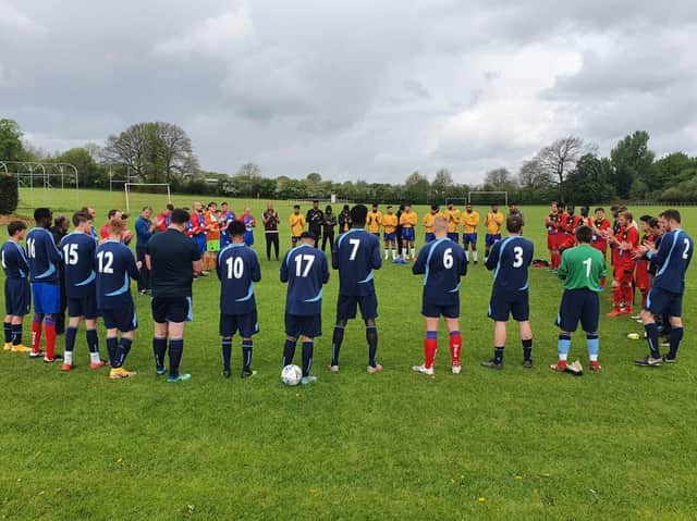 Wakefield Athletic’s four teams lead a minute’s applause in memory of Darren Mawson before playing in a memorial football tournament in his name.