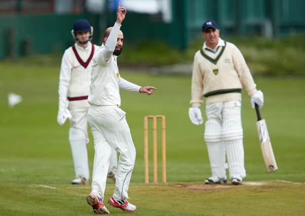 Wakefield St Michael's bowler Syed Shah Bukhari appeals for a wicket against Scholes. Picture: John Clifton