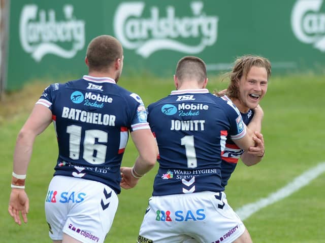 Wakefield Trinity captain Jacob Miller celebrates his try on his return from injury against Hull KR. (DEAN WILLIAMS)