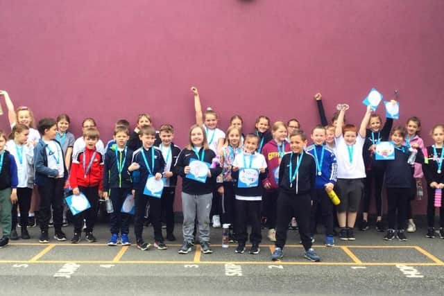 Primary school pupils from Willow Green Academy in Ferrybridge raised more than £5,000 for charity in a Race for Life fun day.