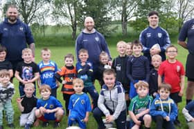 Featherstone Rovers stars Dean Parrata and John Davies at Hemsworth Dragons’ training night when they met the club’s ‘Baby Dragons’ juniors squad. Picture: Angie Breen