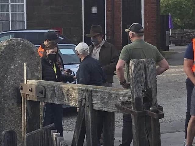 The Star Wars and Blade Runner star was seen sporting the iconic high-crowned fedora and brown jacket in quaint Grosmont, nestled in the North York Moors. (SWNS)