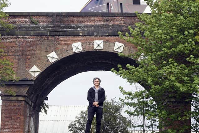 You’ve walked past them, driven under them and maybe even taken a train along the top of them. But how much do you really know about Wakefield’s 99 Arches? Artist Tony Wade is seen under one of the arches. Photo: Scott Merrylees