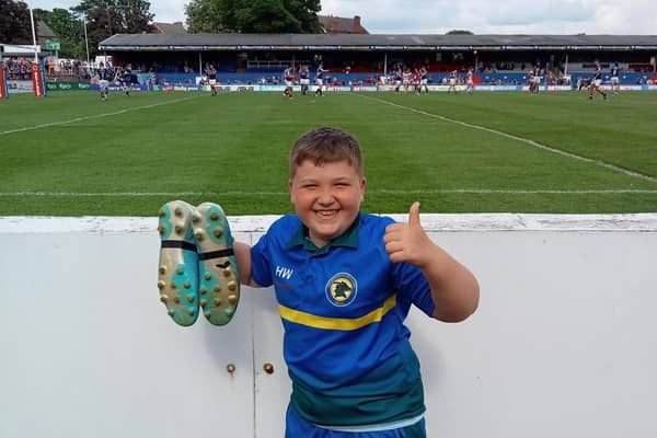 Harry was delighted when Junior S'au the Leigh centre presented him his boots at the end of the Wakefield Trinity v Leigh Centurions match on June 6