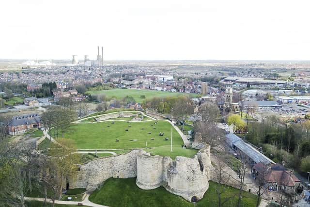 An aerial view of Pontefract Castle, with Ferrybridge Power Station visible on the horizon. Coun Jeffery says she is determined to make sure that the entire Wakefield district will be represented in the City of Culture bid. Photo: Scott Merrylees
