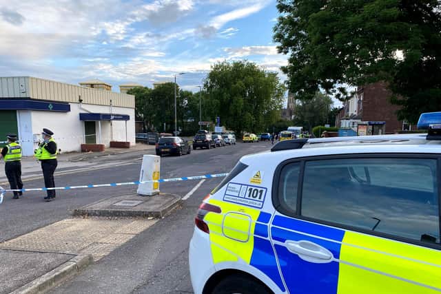 Two men have been rushed to hospital and remain in a critical condition after a stabbing on a Wakefield street. Police are seen on Upper Warrengate, Wakefield, last night.