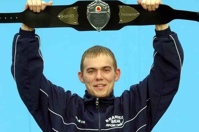 Sean Hughes with his 2003 Central Area Super Bantomweight Title belt