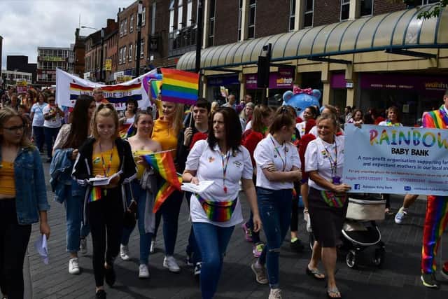 People parading through the city at a previous event.