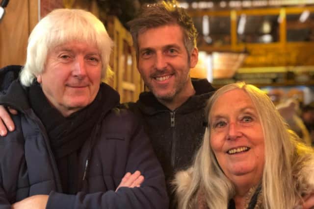 Chris with his mum and dad, Martin and Jenny.