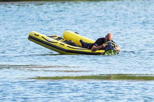 Police are continuing to search the lake at Pugneys Country Park this morning, after reports that a man was seen in difficulty in the water. Photo: Scott Merrylees