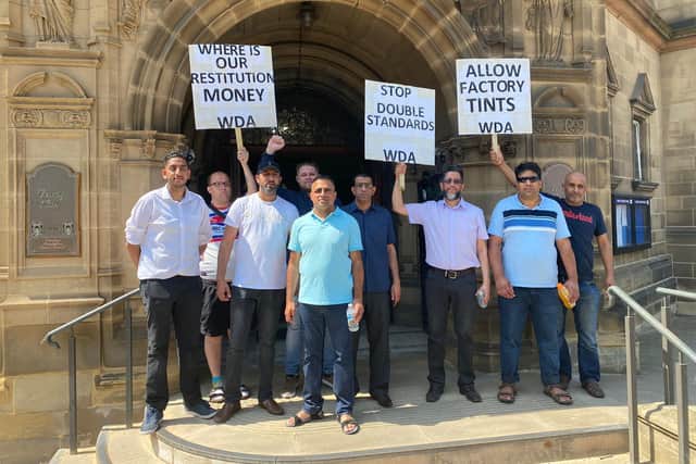 Drivers on the steps of County Hall.