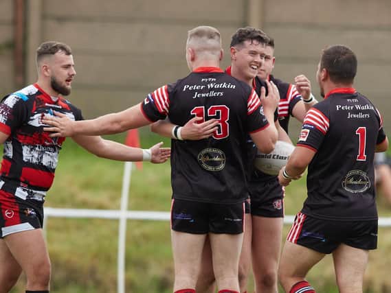 Normanton Knights' Bradley Westwood celebrates scoring a try against Eastmoor Dragons. Picture: John Clifton