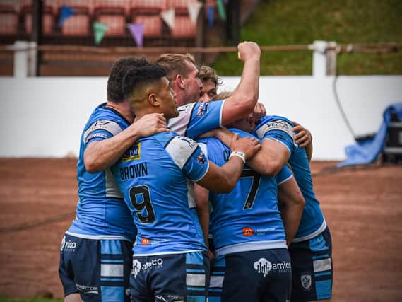 ANOTHER ONE: Featherstone Rovers players celebrate during their win over Bradford Bulls on Sunday as they made it 13 league games unbeaten this year. Picture: Dec Hayes Photography.