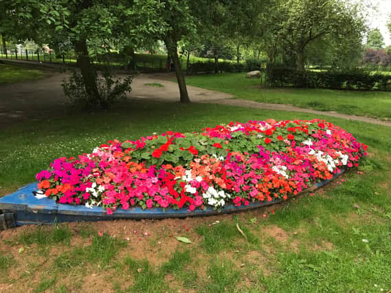 Pontefract in Bloom, one of the old rowing boats in Pontefract Park turned into a planter.
