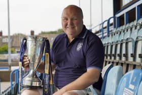 Featherstone Rovers chairman Mark Campbell with the 1895 cup the team won at Wembley.