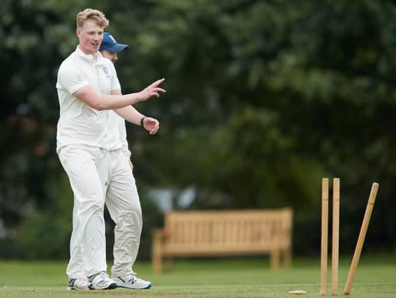 East Ardsley's Jonathan Macgregor celebrates taking a Spen Victoria wicket. Picture: John Clifton