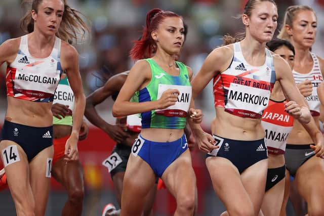 Amy-Eloise Markovc running at the Tokyo Olympics with teammate Eilish McColgan on her left. Picture: David Ramos/Getty Images