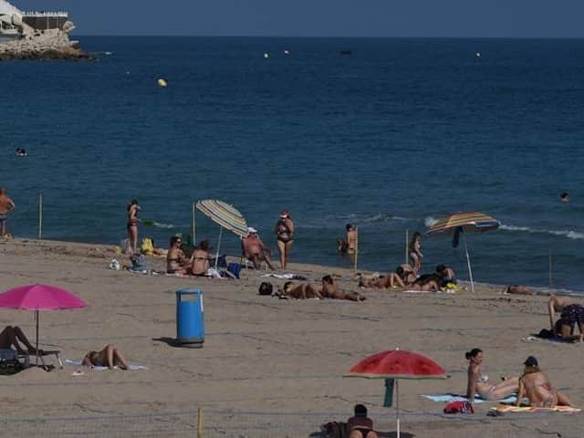 A helicopter and two police boats were sent to Poniente Beach