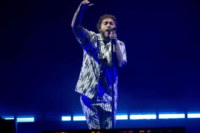 Post Malone on stage on a previous headline show at the Leeds Festival.