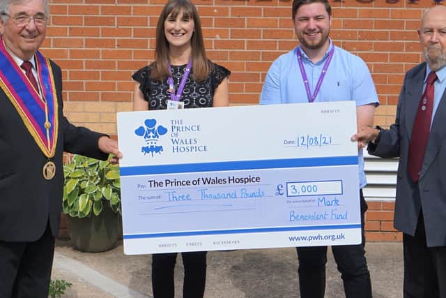 Freemasons Jim Stanley and Stuart Highfield, with Rebecca Taylor and Adrian Greenwood  from the Prince of Wales  Hospice.