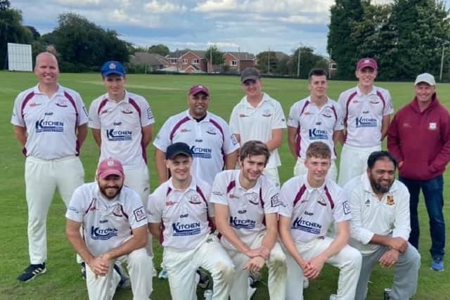 Calder Grove players are all smiles after clinching promotion in Division Three of the Pontefract League - their third promotion in successive years.