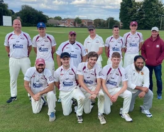 Calder Grove players are all smiles after clinching promotion in Division Three of the Pontefract League - their third promotion in successive years.