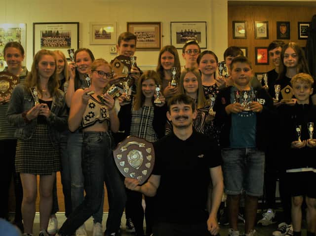 Track and field award winners with the trophies they received at Pontefract Athletics Club's annual presentation night. Picture: Duncan Fraser