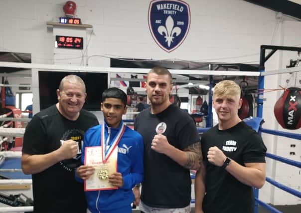 Wakefield Trinity AB's national boxing champion Hussain Zaman with his trainers Neil Coleman, Ric Bennett and Danny Pickup.