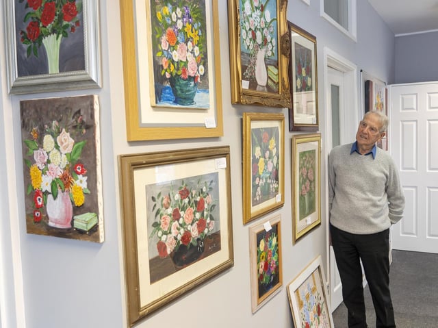 Ralph Thornton with a selection of the paintings at The Lock Lane Gallery.