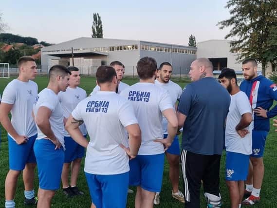 Darren Fisher passes on his words of wisdom while coaching the Serbia national RL team players.