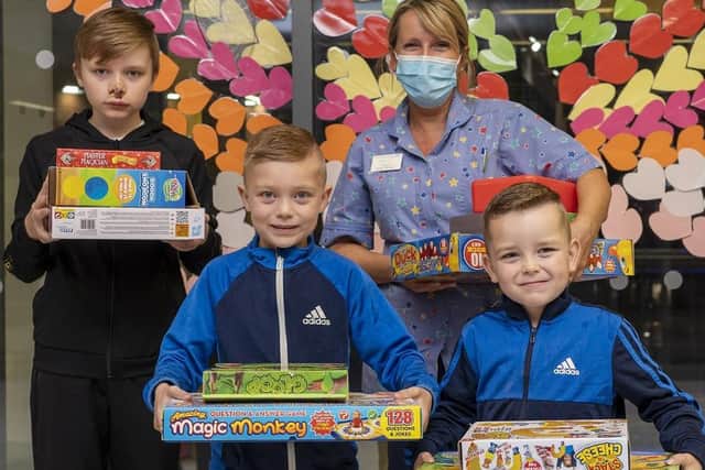 Brothers Alfie, Billy and Harley have donated toys to the Children's Ward at Pinderfields Hospital. (Picture Scott Merrylees)