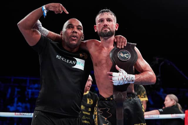 FEELING CHAMPION: Dom Hunt, right, with trainer Junior Witter, left. Picture: Mark Robinson/Matchroom Boxing.