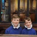 singing together: Brothers Rhys Powell (left) and Oliver Powell (right).