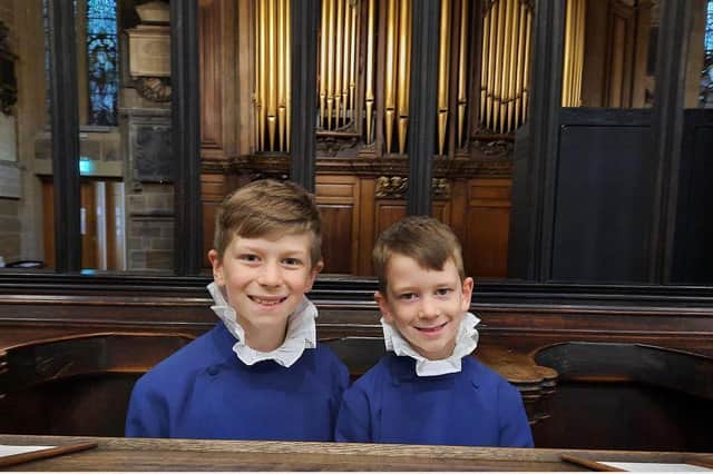 singing together: Brothers Rhys Powell (left) and Oliver Powell (right).