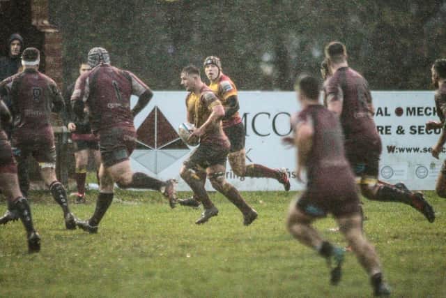 Muddy Moments: Action from a rain soaked Sandal game against Rossendale. Picture: Simon Hall
