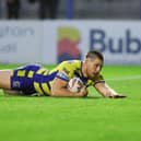 Picture by Paul Currie/SWpix.com - 24/06/2021 - Rugby League - Betfred Super League Round 11 - Warrington Wolves v Leigh Centurions - Halliwell Jones Stadium, Warrington, England - Warrington Wolves' Tom Lineham runs the whole length of the pitch to score a try