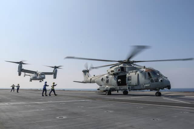 Merlin MkIV and MV-22B Osprey lands on HMS Queen Elizabeth. Photo: UK MOD
