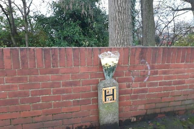 A floral tribute has been placed at the scene in Ossett.