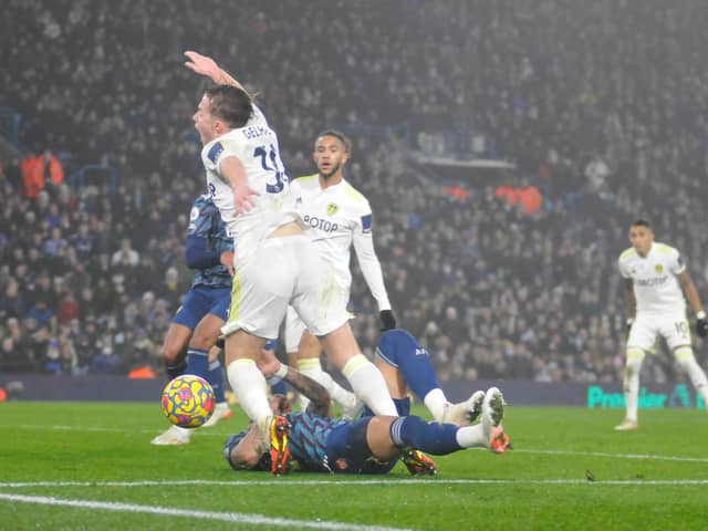 Joe Gelhardt is sent sprawling in a tackle by Ben White to win a penalty for Leeds United against Arsenal.
