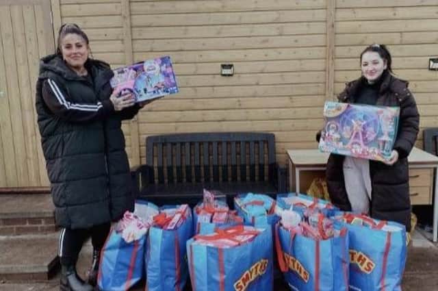 Wild & Wood founders Hollie Sharpin and Lorna Hirst with some of the toys they have donated to local children's charities.