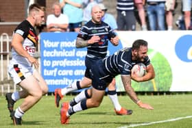Thomas Minns scores for Featherstone against Bradford. Picture by Simon Hulme.