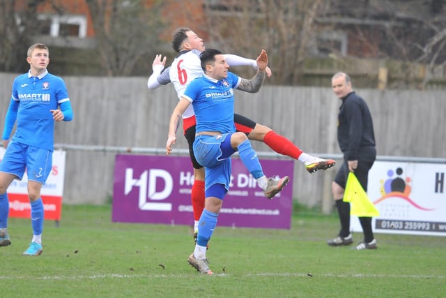 Action from Horsham YMCA's 1-0 win over Hassocks in the SCFL premier division at Gorings Mead / Picture: Steve Robards