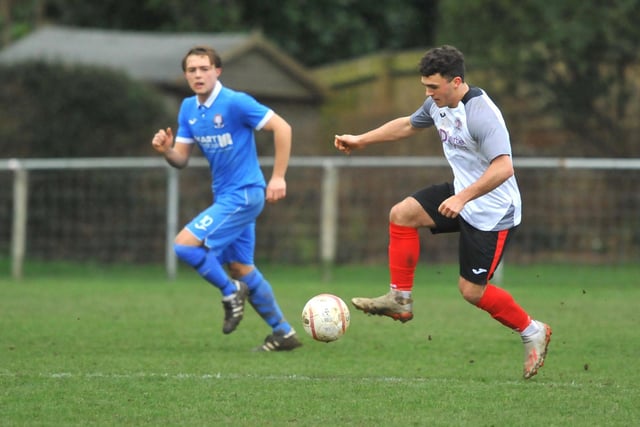 Action from Horsham YMCA's 1-0 win over Hassocks in the SCFL premier division at Gorings Mead / Picture: Steve Robards