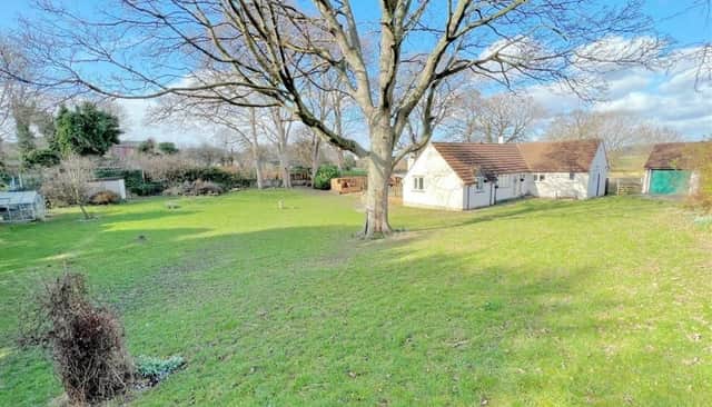The four-bedroom Knottingley bungalow sits within an acre plot.