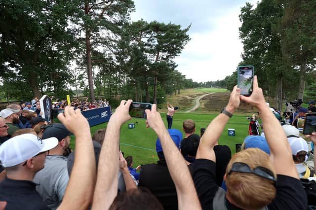 Spectators take photographs with their mobile phones (Photo by Luke Walker/Getty Images)